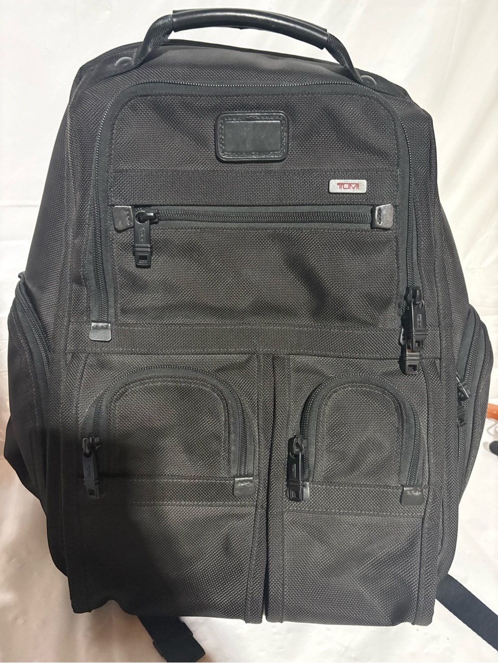 Tumi Black Men's Backpack with Multiple Front Pockets